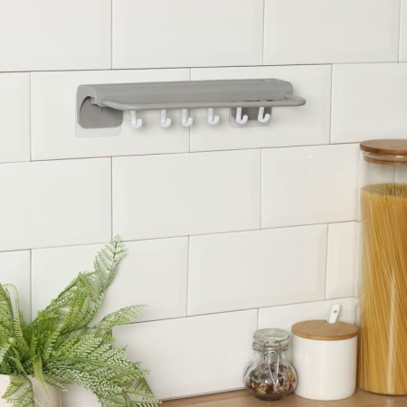 Holder for kitchen accessories with a holder for towels-5