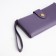 Women's wallet on the button, purple color