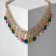 The necklace "Burleske" hanging crystals, colored in gold, 30cm
