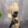 Souvenir Polystone Summary "African in a golden dress with ornament" 18.5x12x15.7 cm