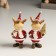Polystone souvenir "Losik in red caftan and cap with a Christmas tree/gift" MIX 4x5x10 cm