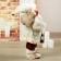 Santa Claus "in a fur coat, with a flashlight and hotel" 46 cm