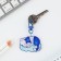 Acrylic “cat” keychain with carbine, 4.3 x 5.5 cm