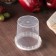 A plastic single can with a white handle, 155 ml, d = 6.9 cm, without a lid, the color is transparent