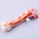 A toy for dogs with a bone of textiles, 19.6 x 6.6 cm