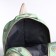 A backpack with a zipper, bag, cosmetic bag, green color