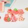 Children's ring "chosen" strawberry, shape mix, color of b-r
