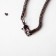 Pendant "madness" spiral, white-gray color, l = 70 cm