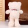 Soft toy "Bear" with a checkered bow, 30 cm, white color