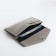 Women's wallet on the button, gray color