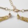 Set 2 objects: earrings, necklace "waterfall" ring, white color in gold, d = 13 cm