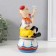 Souvenir Ceramics musical "Clown with butterfly and flower, sits on a cup" 9.5x10x18 cm