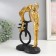 Polystone souvenir "Kiss, pair, monocycle and balloon" Gold 26x17x11 cm