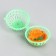 Mouse in a plastic ball, 7 x 5 cm, green ball/orange mouse
