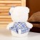 Soft toy "Bear", in a blue dress, 22 cm