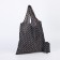 Folding bag without fastening, with carbine, black/brown color