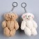 Soft toy "Mishutka" on the suspension, color mix