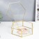 Casket glass with a metal frame "Hexagon with faces" gold 7.5x17x20 cm