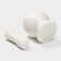 A mortar with a “marble” push, made of natural stone, white color