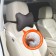Siger pillow "Automobile Bone", on a car's headrest, perforated eco -leather, black