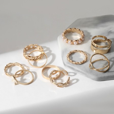 Set of rings 10 pieces "trend" lady, white color in gold, size mix-1