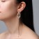 Hanging earrings with Hollywood rhinestones with threads, white color in gold, 13.5 cm