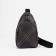 Women's sling bag made of artificial leather, brown color
