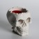 Figure candle in concrete "Crying skull", red