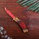 Wooden souvenir "Butterfly knife" red granite