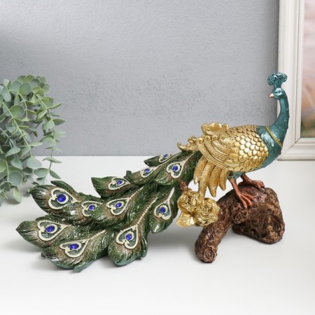 Polystone souvenir "Peacock with green gray feathers, Sapphire on the snag" 32x14x20.5 cm