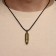Set 2 objects: pendant, keychain "bullet", black color in black gold, 58 cm
