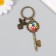 Trick metal, glass "Angel and key with flowers" bronze 10 cm