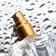 Perfume bottle, with a spray, 15 ml, golden color