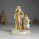 Polystone candlestick "Santa Claus in a brown fur coat with a snowman" d = 3? 5 cm 10.3x9.8x14 cm