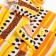 A set for a girl, the color is light beige/black/orange, height 128 cm