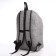 Youth backpack from textiles on a zipper, 3 pockets, headphone opening, color gray color