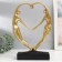 Polystone souvenir "Lovers in the plexus of the heart" gold 37x25x7 cm