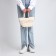 Female wicker bag without fastening, milk color