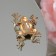 Brooch "Frog" traveler, green color in gold