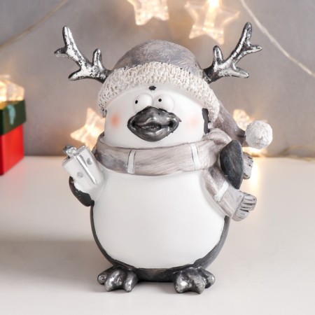 Polystone souvenir "Penguin in a scarf and cap with horns, with a gift" Mix 15.5x13x9 cm