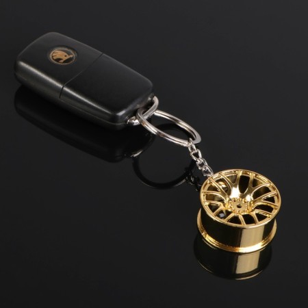 Cartage keychain, disk, golden