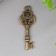 Suspension "Key" aged bronze 1x2.5 cm