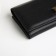 Women's wallet on a magnet, black color
