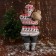 Santa Claus "In a suit with ornaments, skis and twigs" 60 cm, red-white