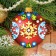 New Year's set for creativity. Decorating the Christmas tree ball with colored foil "New Year!"