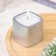 Candle "Square. Marble" in the candlestick of gypsum is small, 5x4.5 cm, silver