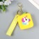 A keychain wallet with a carbine silicone "Bright pictures" Square yellow mix 6x3x7 cm