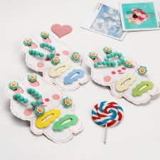 The kit of children's “chosen” 5 items: 2 hairpins, clips, bracelet, ring, flowers, color