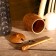 Jar and spoon for honey, tick tree