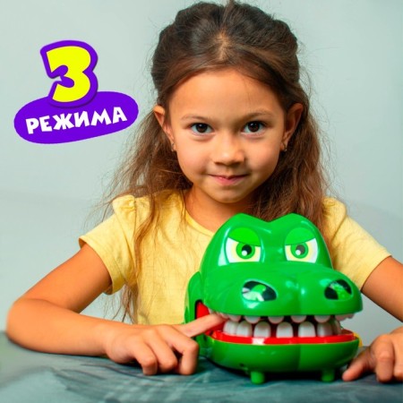 A board game to dexterity and reaction "faster than a crocodile", from 2 players, 4+-7